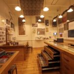 A room with a lot of items on display.